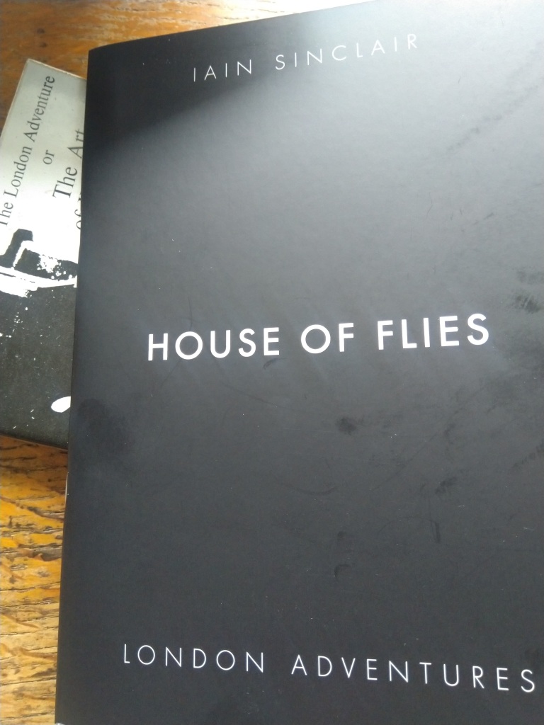 The House of Flies pamphlet, photographed on top of Arthur Machen's The London Adventure.